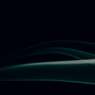 Green swirl on black background